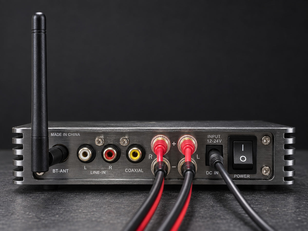 AMP03 rear connection illustration with Bluetooth antenna, four speaker leads and DC power connected; RCA and coaxial inputs unused.